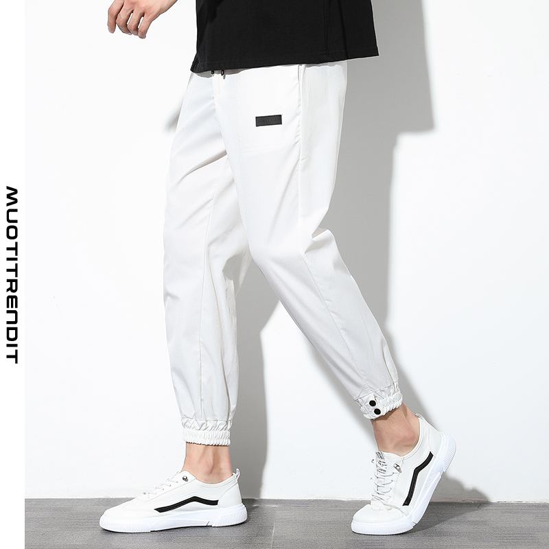 yhdeksän pisteen miesten housut joissa jalat kesällä ja syksyllä plus koko monivärinen yksinkertainen valkoinen